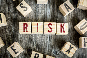 Wooden Blocks with the text "Risk"